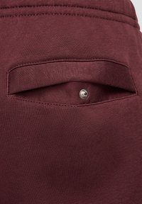 Nike Sportswear CLUB JGGR - Pantalones deportivos - burgundy crush burgundy crush white