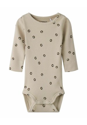 Beige ribbed bodysuit with long sleeves, featuring a small floral pattern in brown and white, with snap closures at the bottom.