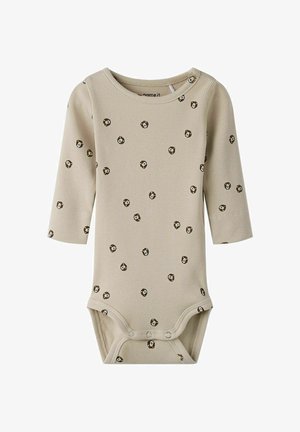 Beige ribbed bodysuit with long sleeves, featuring a small floral pattern in brown and white, with snap closures at the bottom.