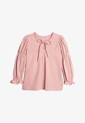 Różowa koszulka dla malucha z długim rękawem, marszczonymi bufkami, okrągłym dekoltem, zakładką z przodu oraz kokardką przy kołnierzyku.