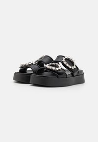 CHIARA FERRAGNI Platt slip-in - black