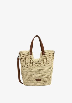 Beżowa torebka na szydełku z brązowymi skórzanymi uchwytami i odpinanym paskiem na ramię.