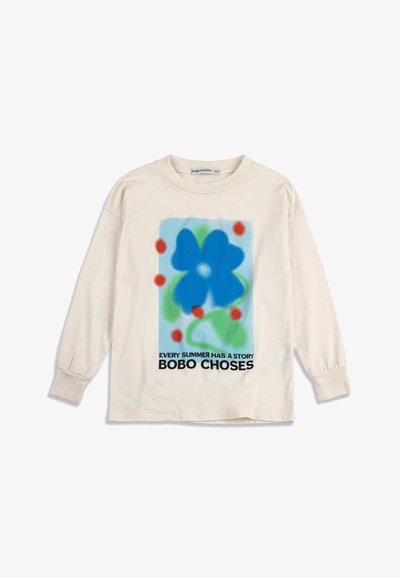 Cream long-sleeve shirt with blue flower, green leaves, red dots, and text "Every summer has a story BOBO CHOSES" on front.