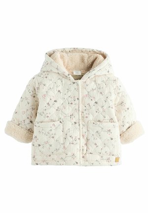 Veste bébé matelassée crème avec imprimé floral, capuche, poches avant et doublure en polaire douce visible aux poignets et à l'intérieur de la capuche.