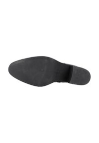 Botín negro hasta el tobillo con un upper de cuero suave, punta redondeada, tacón bajo de bloque y suela de goma texturizada. Presenta un sutil detalle de costura.