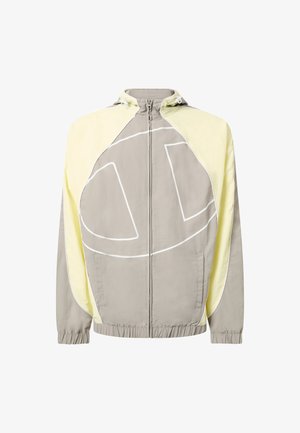 Veste à capuche gris clair zippée avec panneaux jaune pâle sur les manches, motif abstrait blanc en lignes sur le devant, et poignets et ourlet élastiques.