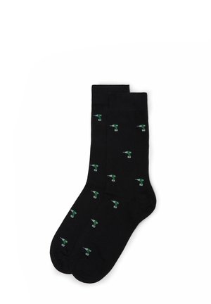 Schwarze Socken mit einem wiederholten Muster aus kleinen grünen und weißen Bohrillustrationen. Hergestellt aus einem weichen, dehnbaren Stoff für Komfort.