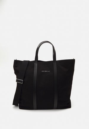 Zwarte rechthoekige tote-tas met dubbele handvatten en verstelbare schouderriem, met Emporio Armani-logo centraal aan de voorkant.