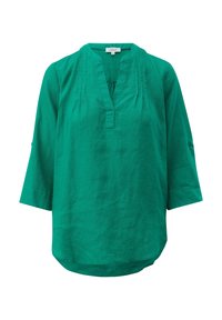 Grüne, leichte Bluse aus Leinen. Sie hat einen V-Ausschnitt, dreiviertel Ärmel und subtile Falten entlang der Vorderseite für Textur.