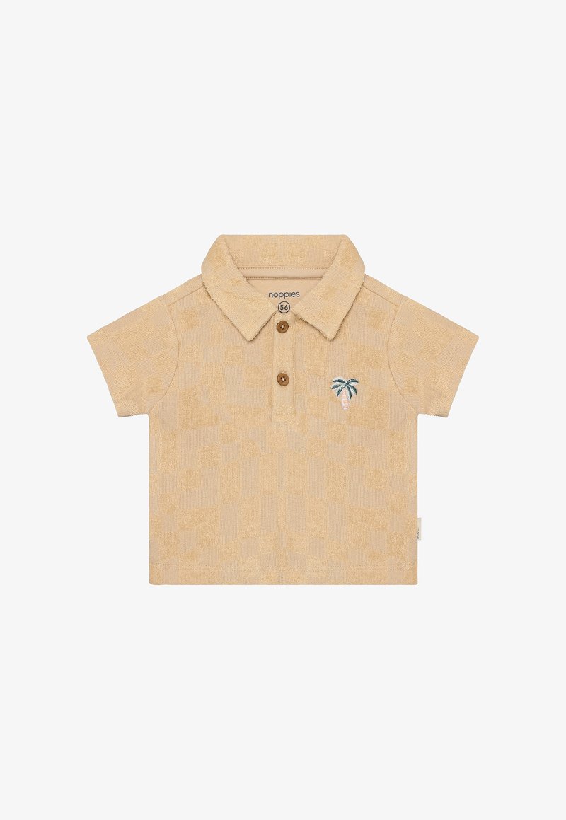 Polo à manches courtes en coton beige doux avec motif texturé, patte à trois boutons et accent de palmier brodé sur la poitrine.