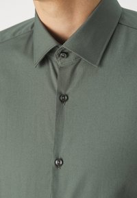 HUGO JENNO - Ing - dark green