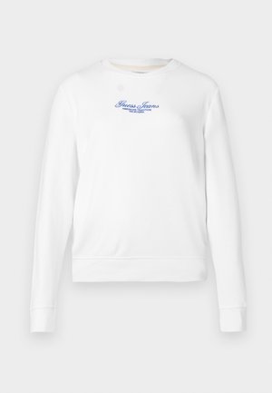 Bílá mikina s dlouhými rukávy, kulatým výstřihem, žebrovanými manžetami a lemem. Obsahuje modrou výšivku s logem "Guess Jeans" na přední straně.