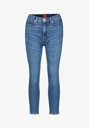 Slanke jeans lavet af mellemvaske denim, med et klassisk fem-lomme design, stikninger og en subtil falmeffekt.