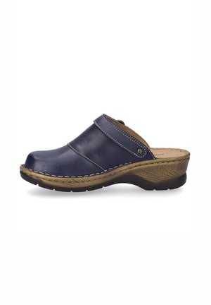 Navy leather clog with a wide strap, rounded toe, and raised heel. Features contrast stitching and textured dark brown sole.