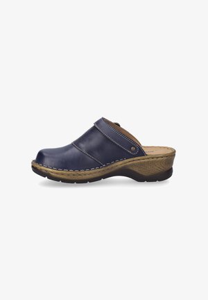 Navy leather clog with a wide strap, rounded toe, and raised heel. Features contrast stitching and textured dark brown sole.