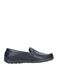 Mocasines de cuero negro sin cordones con punta redonda, acentos texturizados y suela de goma flexible. Acabado suave con detalles de costura mínimos.