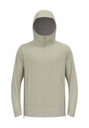 Giacca beige chiaro con cappuccio, chiusura con zip frontale e due tasche laterali. Tessuto morbido, design aderente e polsini elastici.