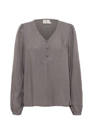 Blouse grise en tissu lisse, avec un col en V, trois boutons sur le devant et de longues manches bouffantes avec des poignets élastiques.