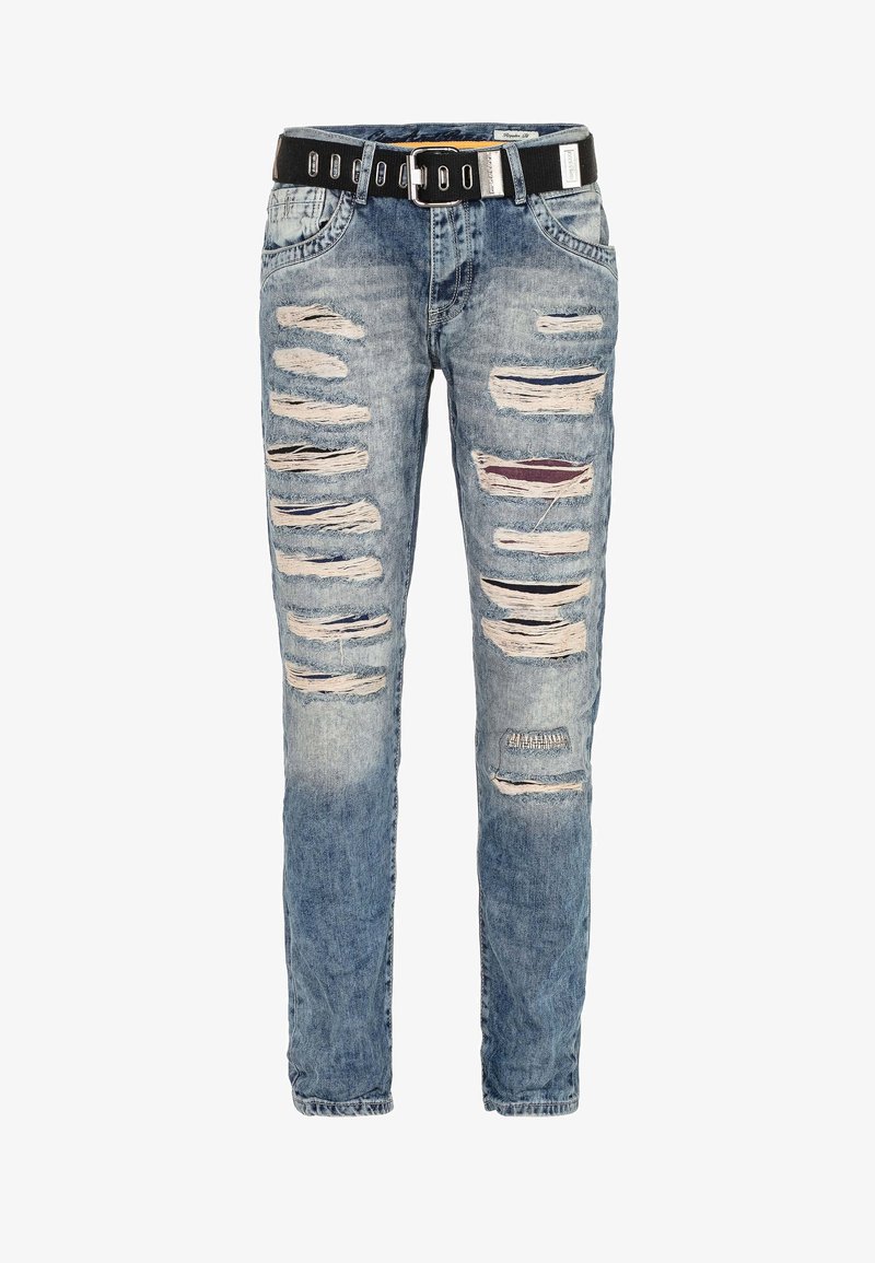 Blue denim jeans with a slim fit, featuring multiple distressed rips, a black belt with silver hardware, and a faded design.