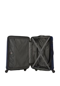 Valigia rigida di colore blu navy con un interno grigio. Presenta doppie compartimenti, chiusura a zip e cinghie incrociate elastiche per assicurare gli oggetti.