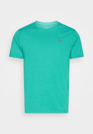 T-shirt en coton turquoise avec un col rond, des manches courtes et un petit logo rouge sur la poitrine gauche. Design simple et de couleur unie.