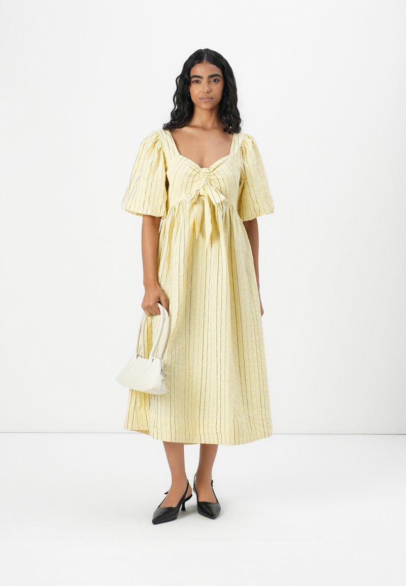 pale yellow flowy dress HATCH Collection The Maisie Dress in Lemon Drop main image 0