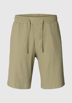 Shorts en tricot côtelé beige avec taille élastique et cordon, longueur au genou, style décontracté.