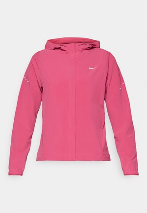 Pink Nike jacket featuring a zip front, hood, long sleeves with elastic cuffs, and reflective accents on the sleeves. Smooth fabric texture.