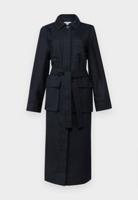 Long, dark blue pinstriped coat with a collared neckline, long sleeves, belted waist, two large front pockets, and a straight cut.