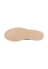 Sole of a shoe in a light beige color, featuring a textured rubber surface with distinct grip patterns and a rounded toe design.