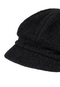 Black woolen newsboy cap with a soft, textured fabric and a short, rounded brim.