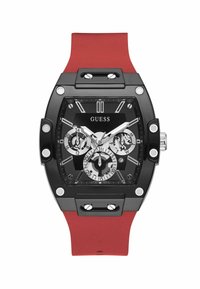 Schwarze rechteckige Uhr mit schwarzem Zifferblatt, silbernen Akzenten und drei Subdials. Sie hat ein rotes Gummiband und auffällige silberne Beschläge.
