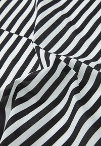 Black and white striped fabric with alternating thin and thick horizontal lines. The material appears smooth and slightly reflective.