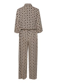 Combinaison noire et beige à motifs avec un design en losange, jambes larges, taille ceinturée et col. Texture de tissu douce.