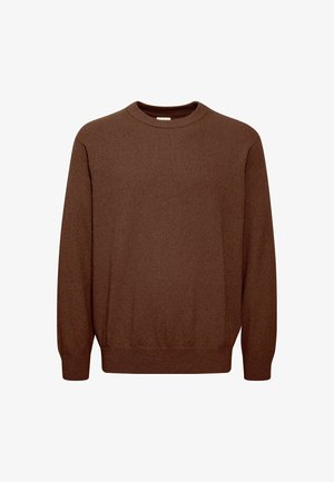 Brūna adīta džemperis ar apaļu kaklu, gariem piedurknēm un ribotām aprocēm un apakšmalu. Gluda tekstūra ar viendabīgu dizainu.