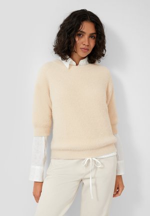 - Sweter