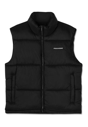 Chaleco acolchado negro con cuello alto, cierre frontal de cremallera y bolsillos laterales. Presenta una textura suave y un logo en la parte superior izquierda.