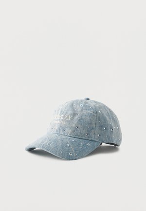 Light blue denim baseball cap with scattered small silver studs and white "REPLAY Since 1981" text on front panel.