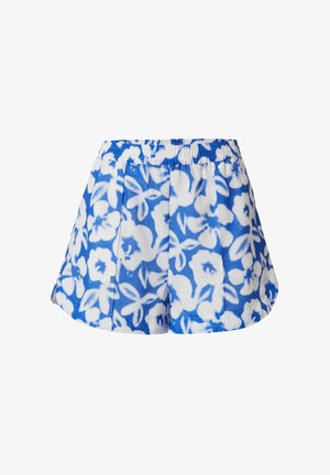 Shorts imprimés floraux bleus et blancs avec une taille élastique, un design plissé et une texture de tissu douce.