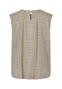 Ärm lös blus med ett geometriskt mönster i kräm, guld och svart. Har en nyckelhålsknäppning i ryggen med en dekorativ knapp. Lätt tyg.