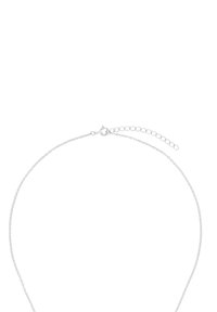 Delikat silverkedja med små ovala länkar och en justerbar förlängningskedja med en fjärringslås.