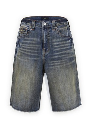 Sinised pleekinud teksapüksid, millel on esimesed taskud, vööaugud, nööpidega sulgur ja paljad ääred.