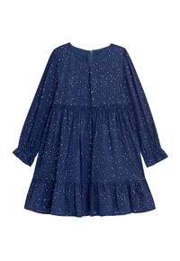 Dunkelblaues Kleid mit langen Ärmeln, gerafftem Bund und rüschengesäumtem Saum. Hat ein gesprenkeltes Muster in Pastellfarben. Reißverschluss hinten.