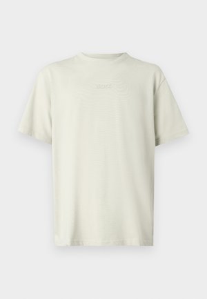 Light beige T-shirt made of cotton, featuring a crew neckline and short sleeves. The word "BOSS" is embroidered in a subtle, tonal color.