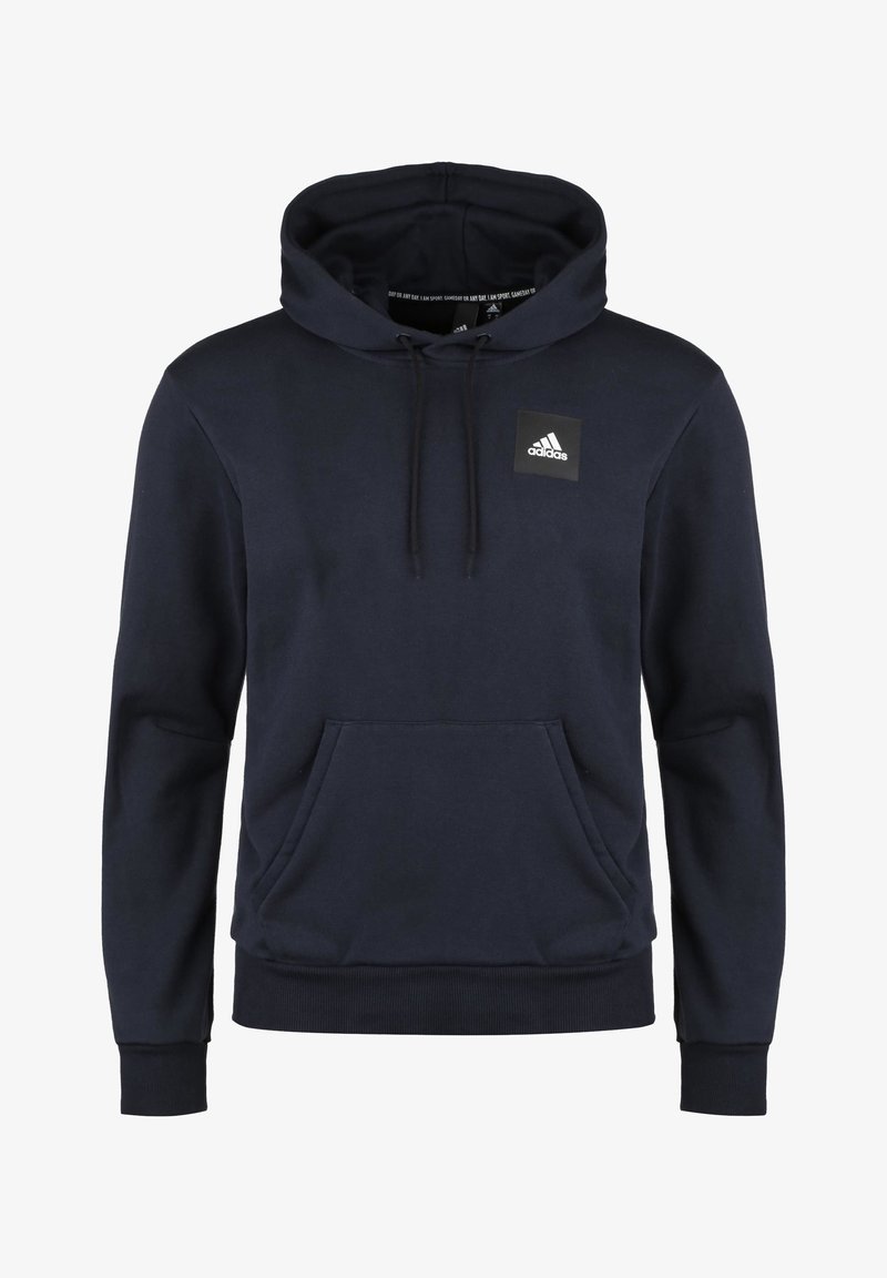 Tummansininen huppari, joka on valmistettu pehmeästä kankaasta. Siinä on edessä kengurupussi, nyörivetoketjuhuppu ja pieni musta Adidas-logo rinnassa.