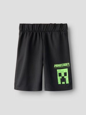 Sorte shorts med elastisk talje og neon-grøn Minecraft-logo samt pixeleret Creeper ansigt på højre ben.