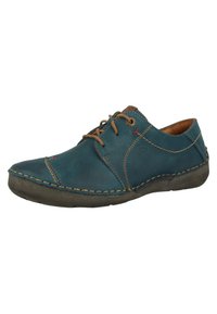 Scarpe stringate in pelle verde acqua con punta arrotondata, cuciture a contrasto e suole imbottite. Presentano una texture morbida e minimi dettagli in metallo.