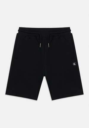 Zwarte casual shorts met elastische tailleband en trekkoord, zijzakken en een klein logoplaatje op het linkerbeen.