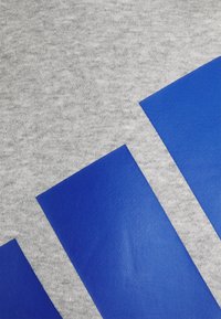adidas Performance Sweat à capuche - medium grey heather/white