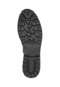 Semelle de chaussure en caoutchouc noir présentant un motif de semelle profond avec des accents texturés et des rainures détaillées pour une meilleure traction. Taille indiquée comme 37.